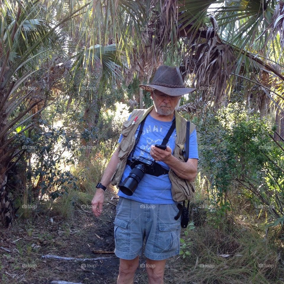 Man with camera and gear