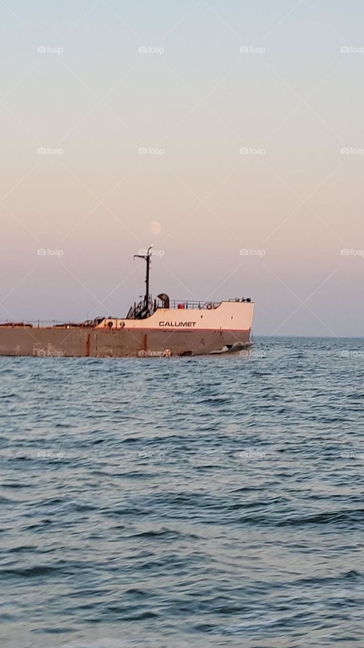 Hazy Moon Over Freighter