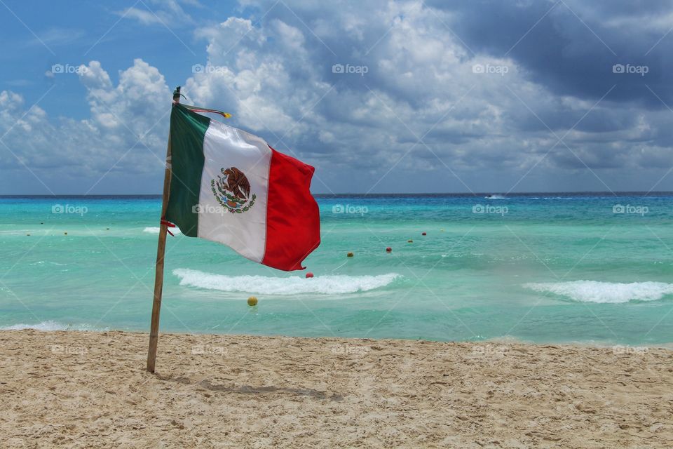 mexican flag in the beach