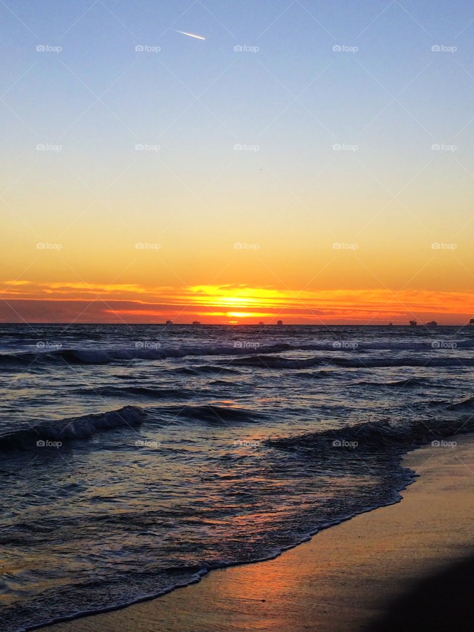 Winter Sunset. Sun setting in Huntington Beach, California