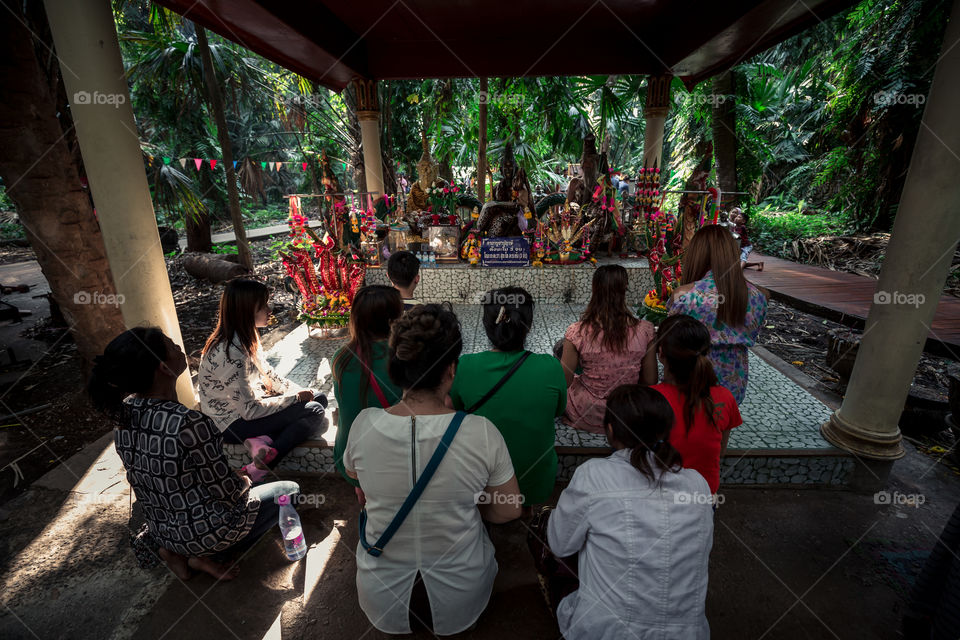 People pay respect in the temple 