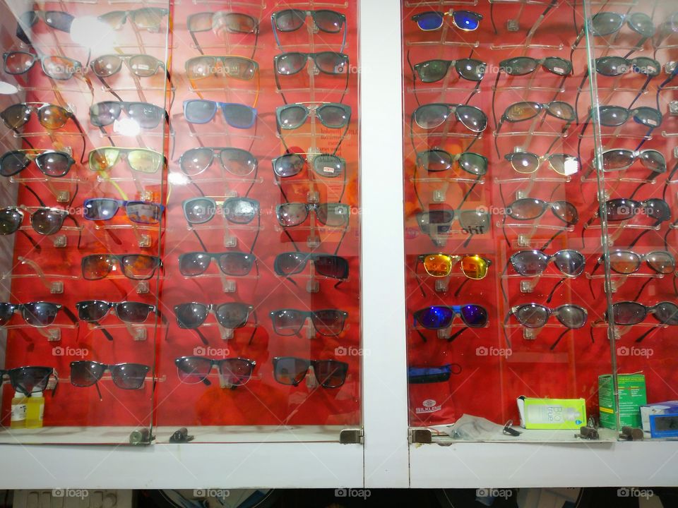 Variety of sunglasses in a row