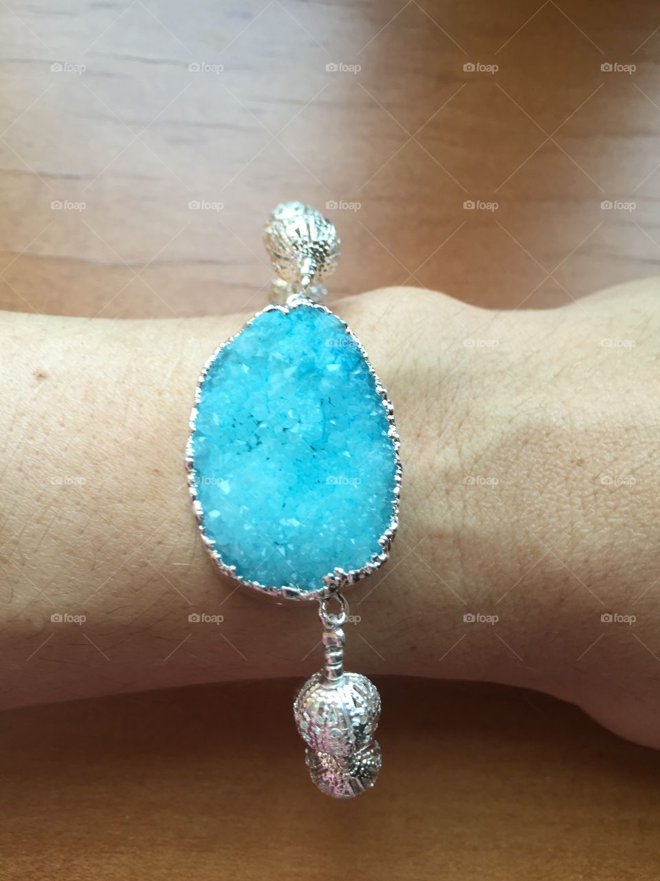 This is a ocean blue agazte druzy connector I made into a bracelet with silver filigree beads, and glass seed beads. 