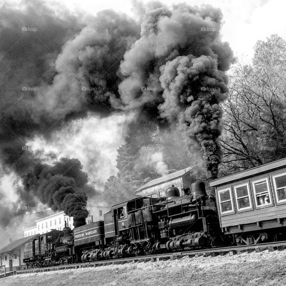 Old scenic railroad train pulling out of the station in Cass, West Virginia