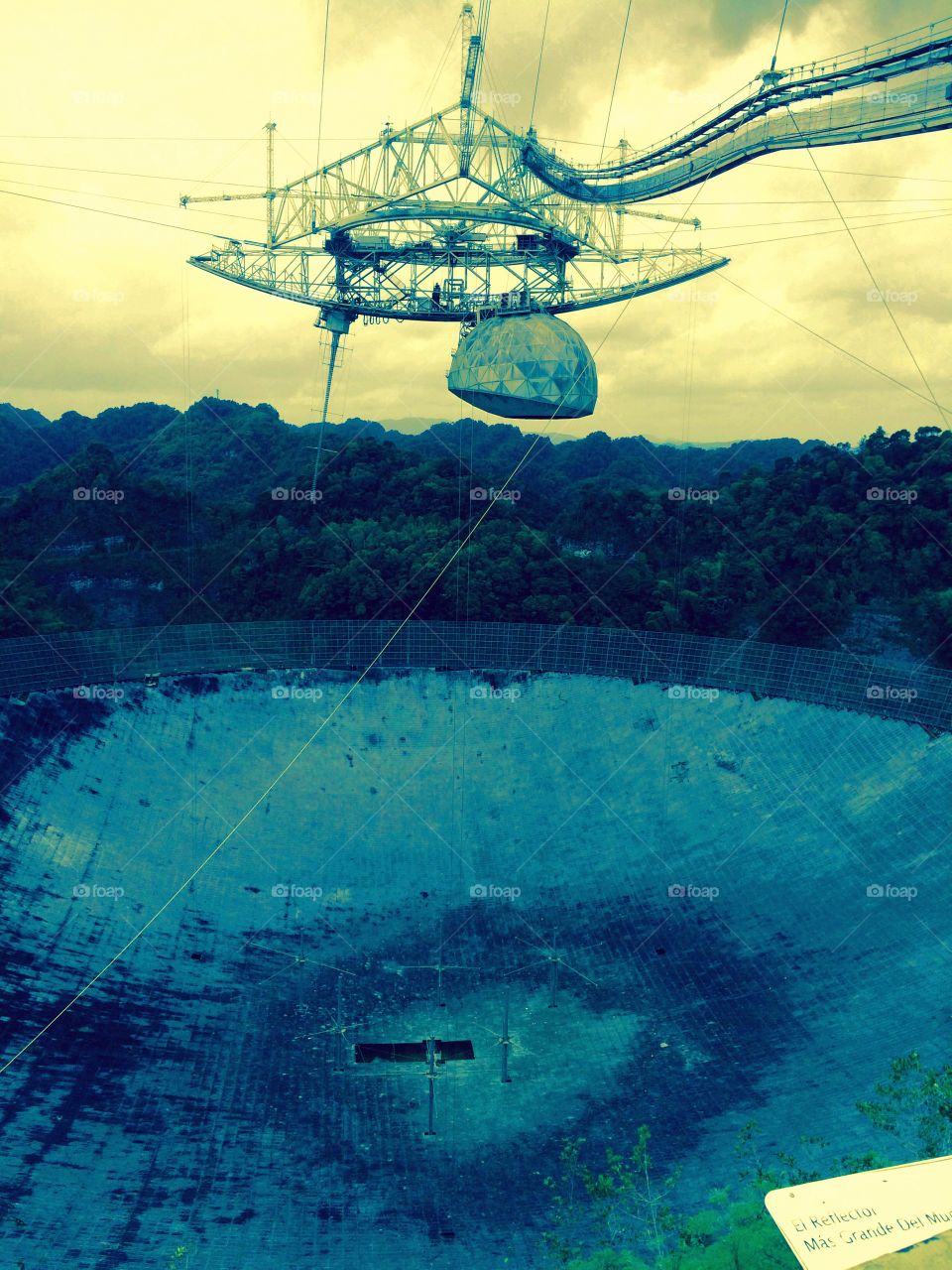 Listening to the Stars. The Arecibo Radio Telescope hidden on the top of the mountains in Arecibo, Puerto Rico.
