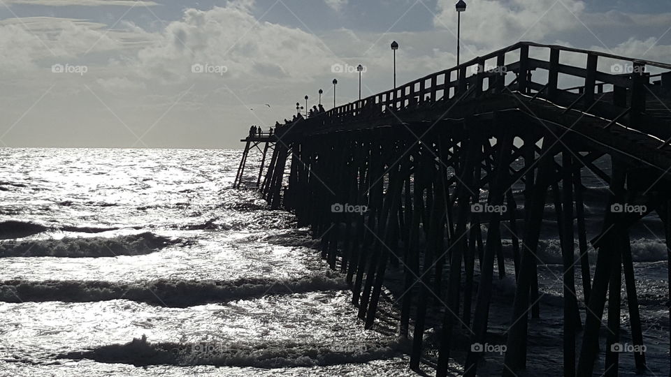 The Pier. A photo of Kure Beach Pier I took this morning on my walk to a local diner for breakfast.