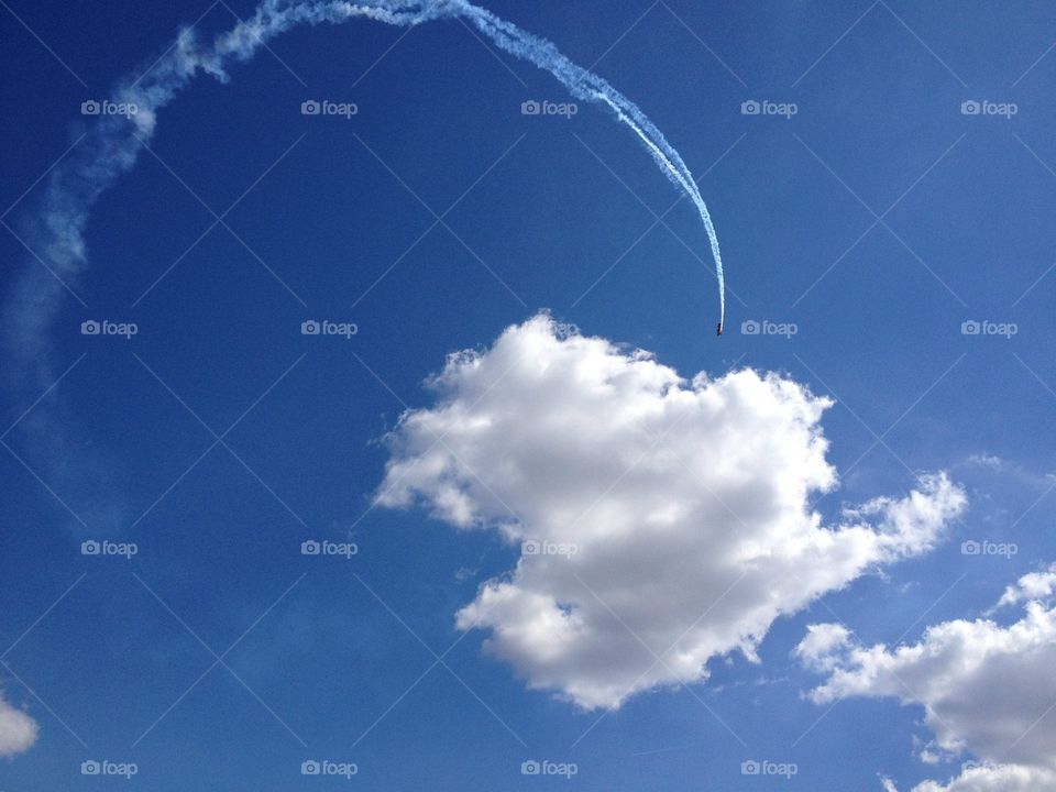 Plane flying into cloud