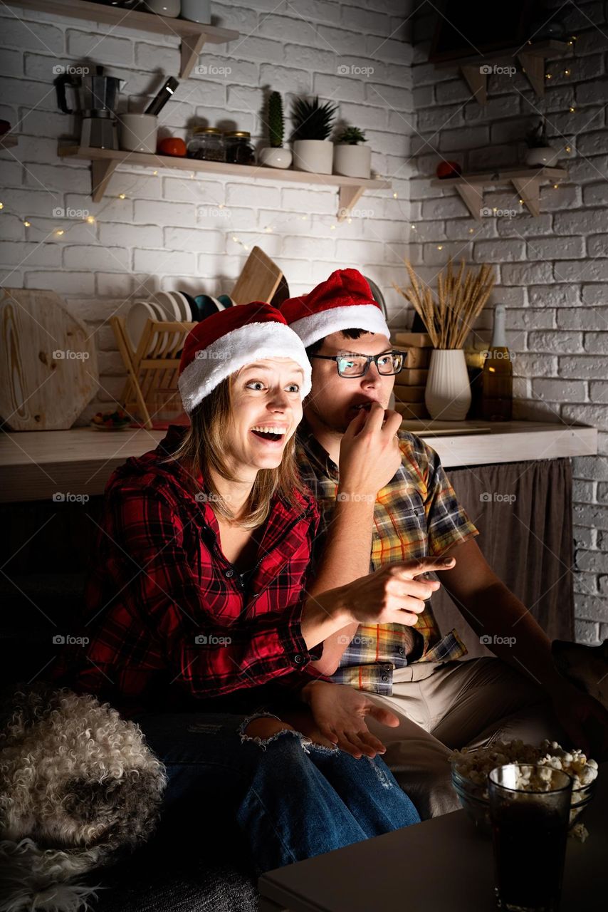 couple watching movies at home