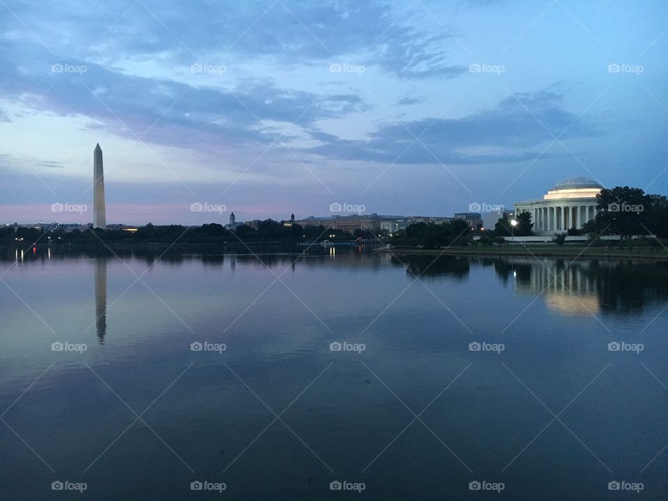 Tidal Basin with Washington Monument and Jefferson Memorial at sunset. 