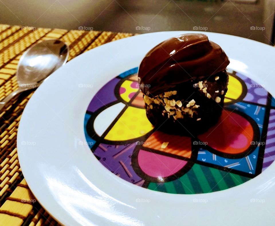 Muffin com chocolate... e Romero Brito