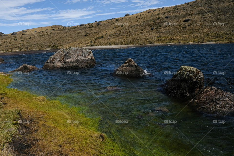 Blue lagoon with hills