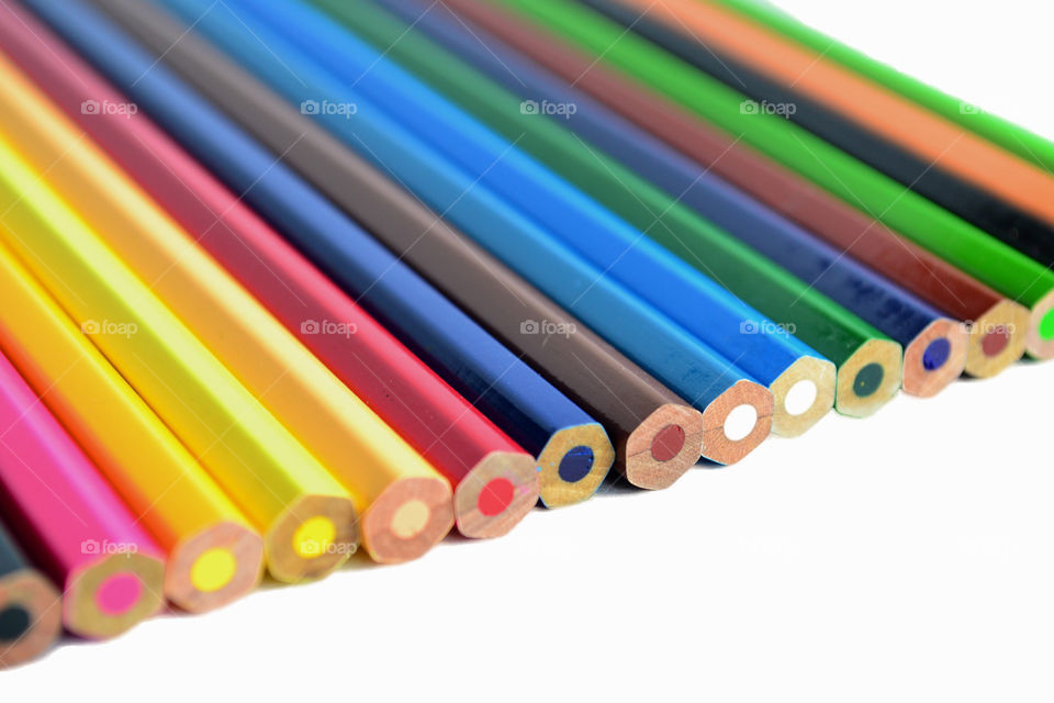 Close up colorful color pencil on isolated white background