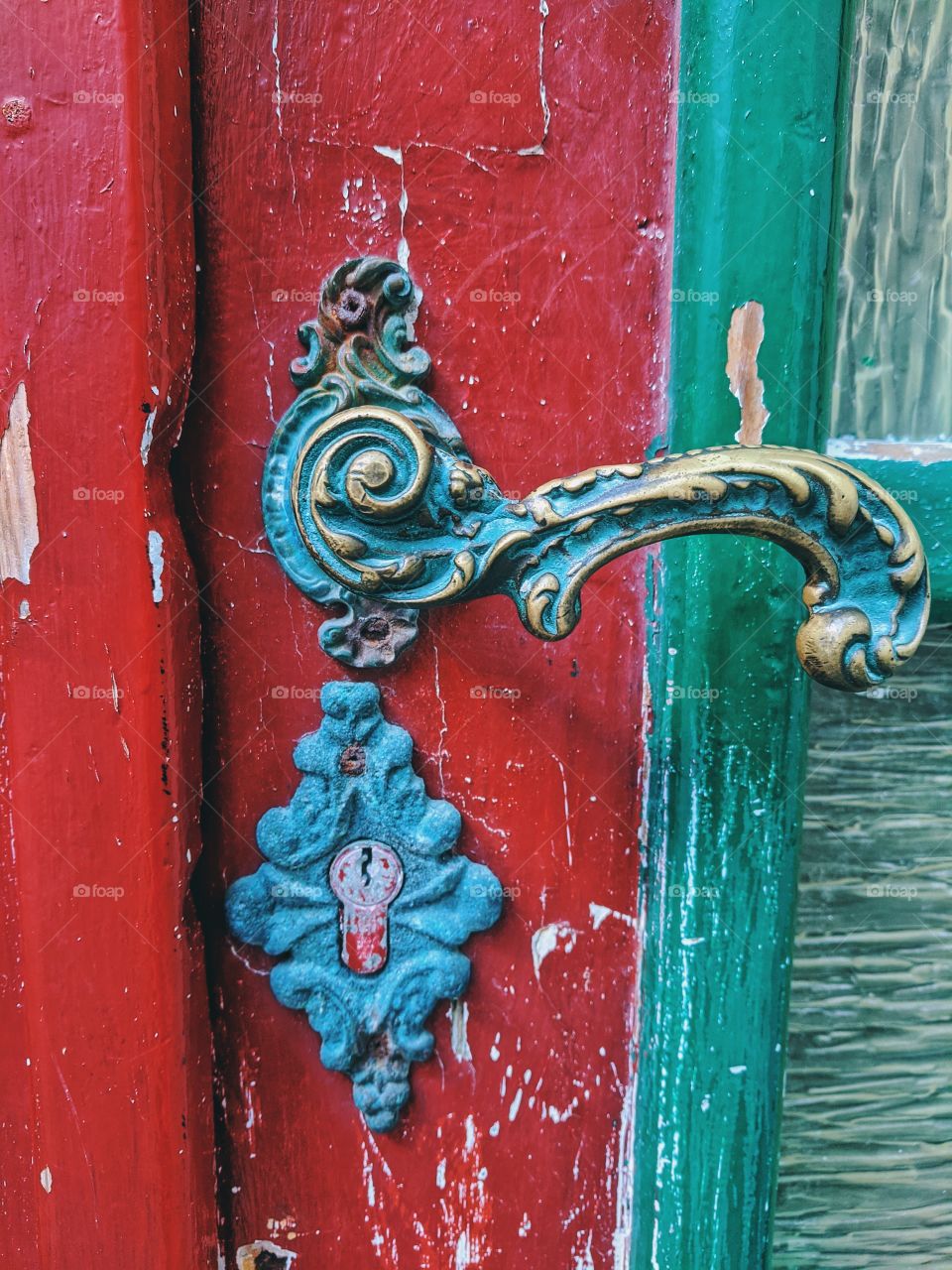 Vintage green door knob in Piran.