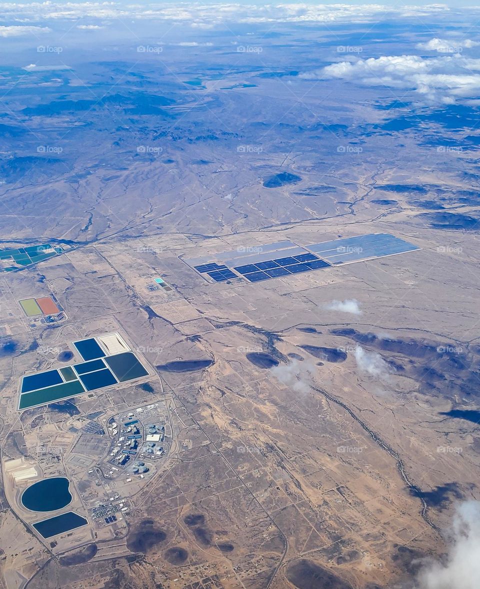 Modern day power in the Arizona desert with nuclear in the foreground and a massive solar field close by