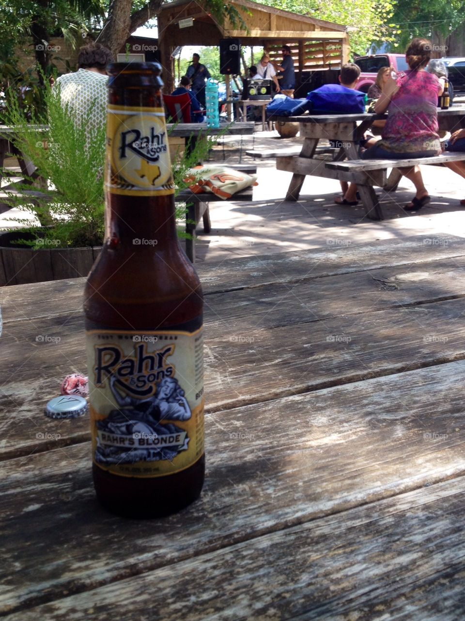 Summer in Texas . Having a nice cold beer and listening to music in Gruene, TX