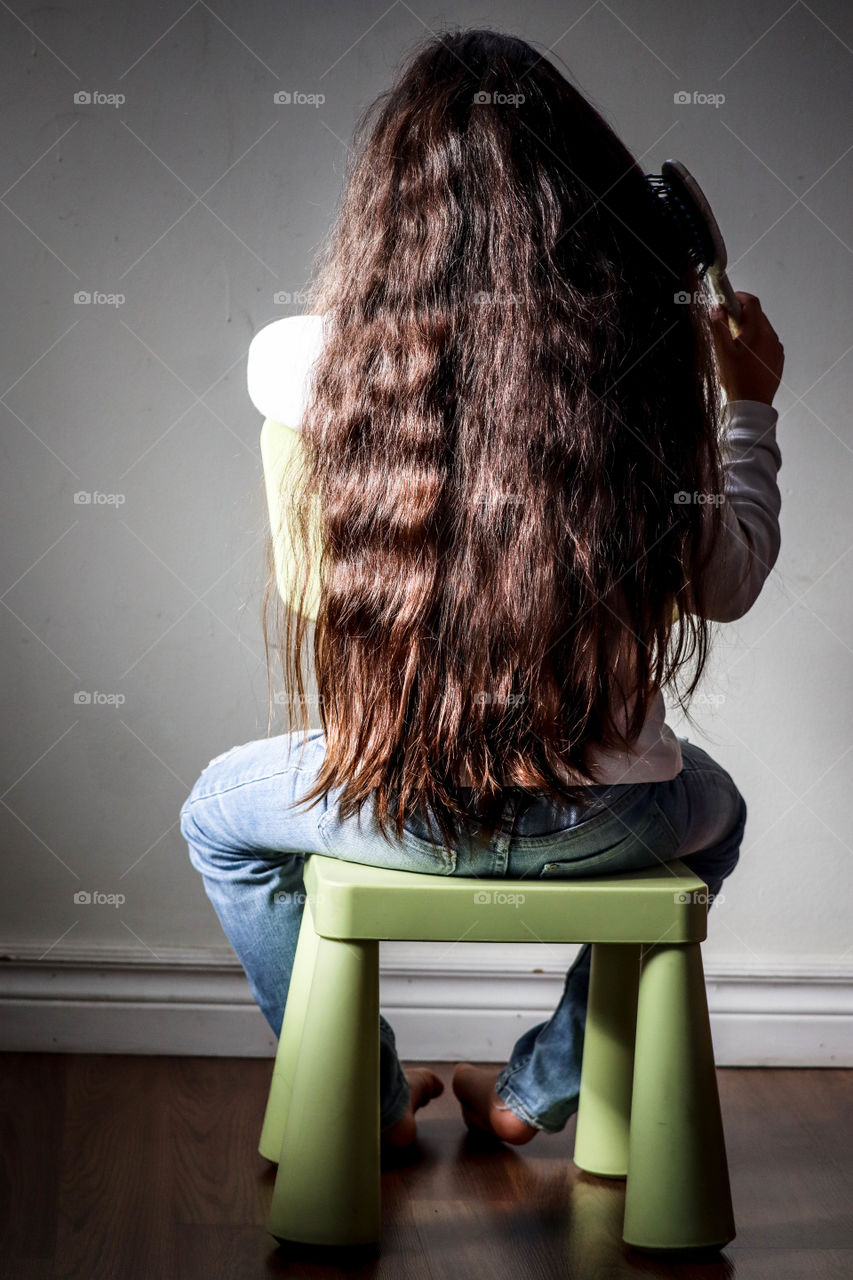 Little girl with a long gorgeous hair