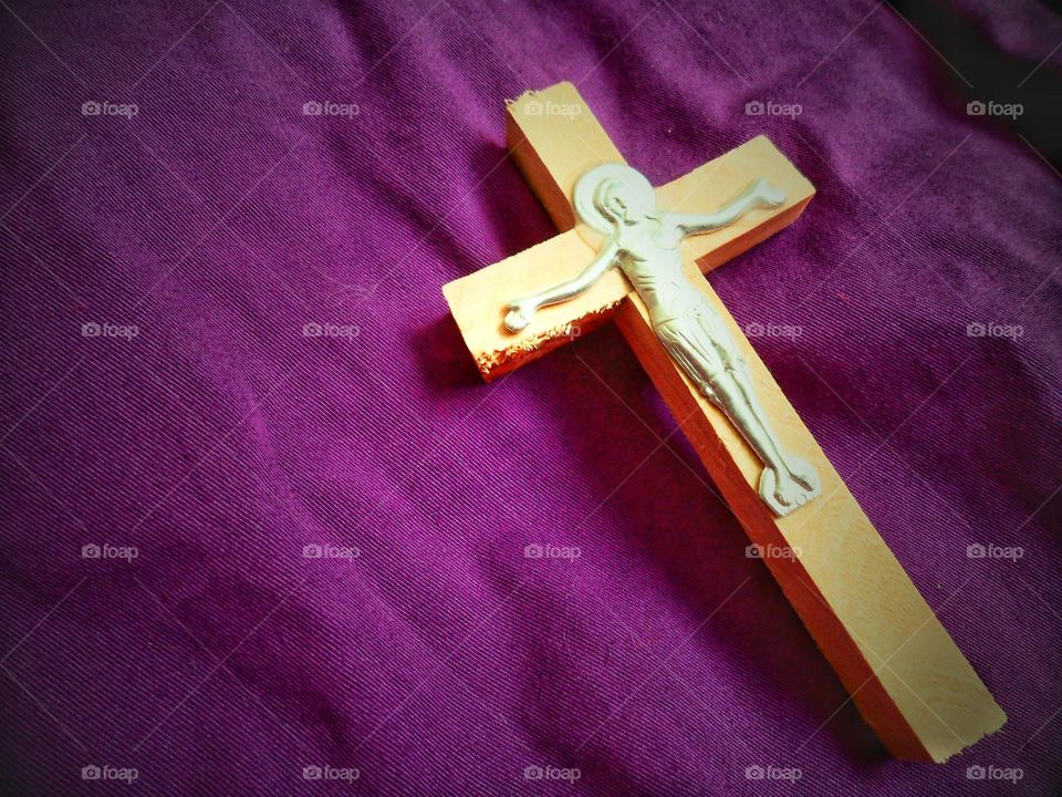 orthodox cross on purple background