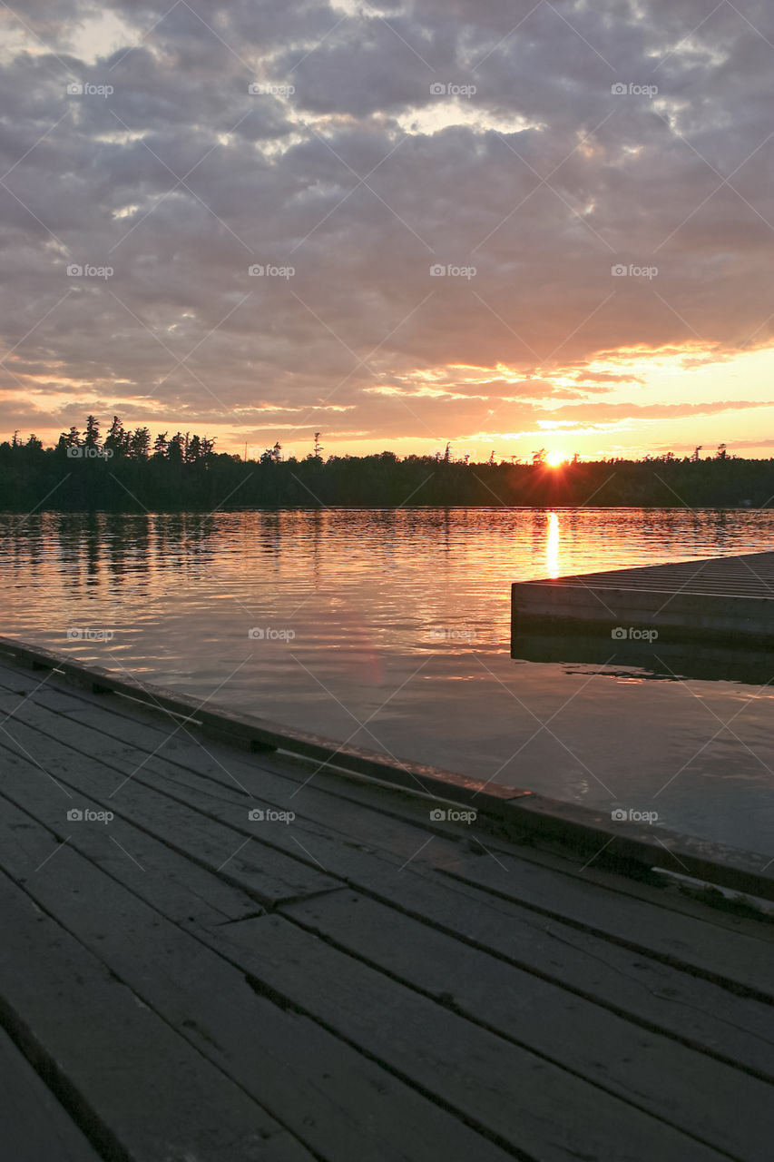 Sunset on North Bay Canadian Lake sitting on the docks.