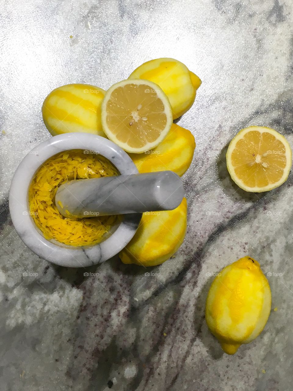 Lemons with mortar and pestle