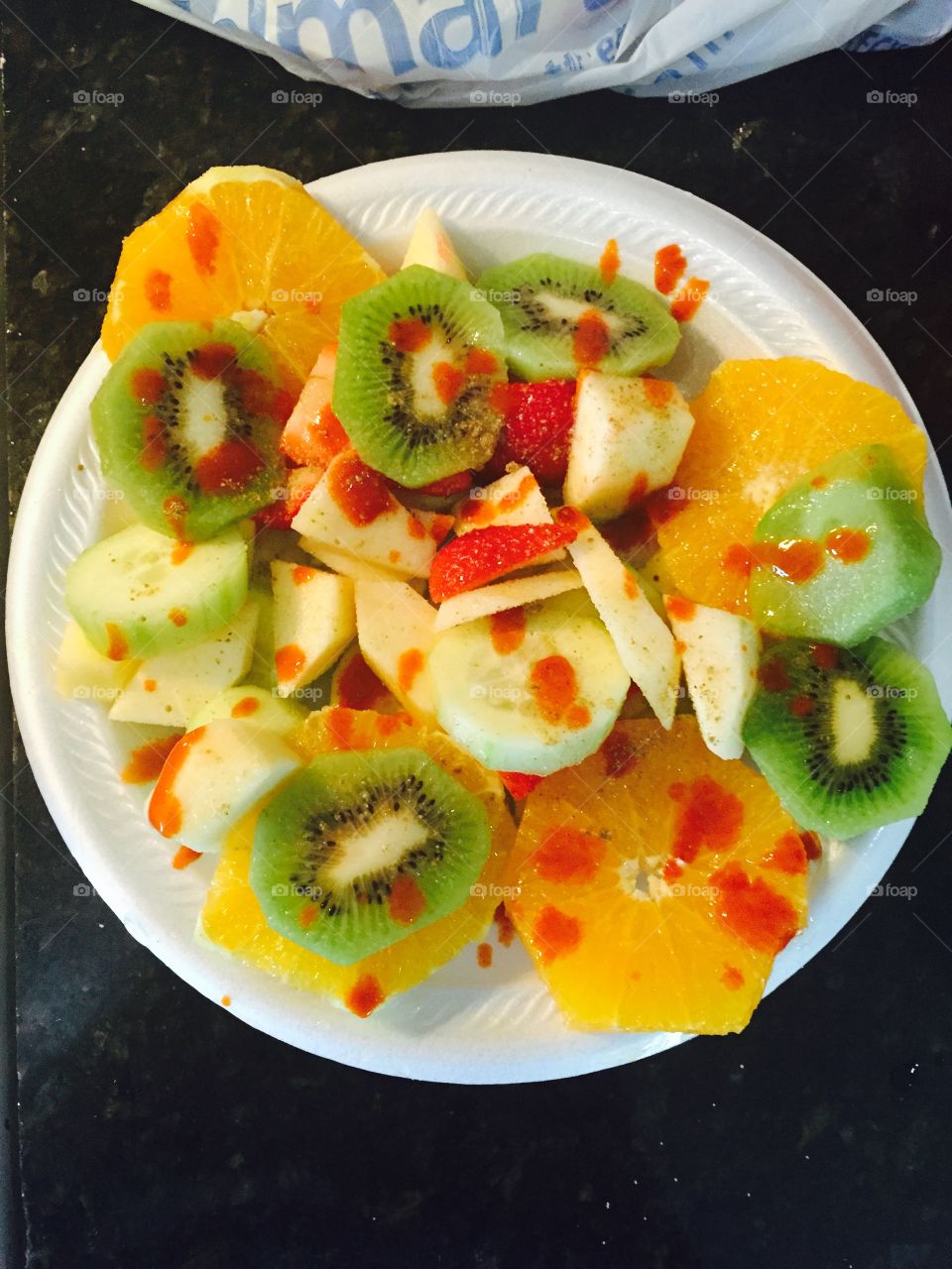 Fruit with hot sauce 😜