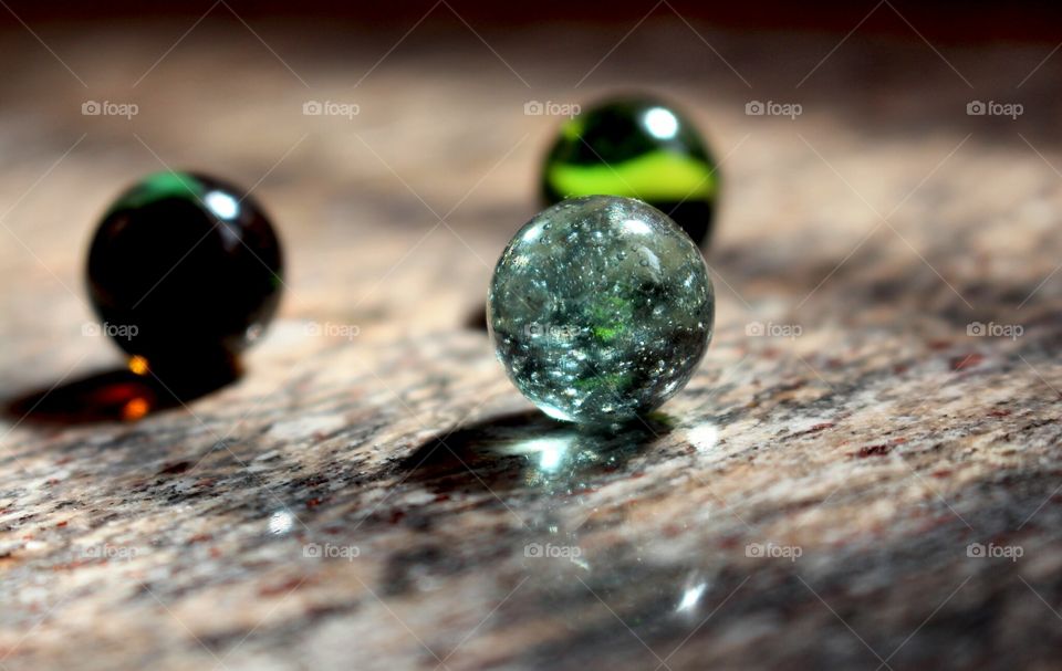 Marbles with a heart shaped reflection 