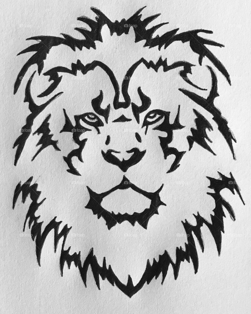 Lion tribal tattoo