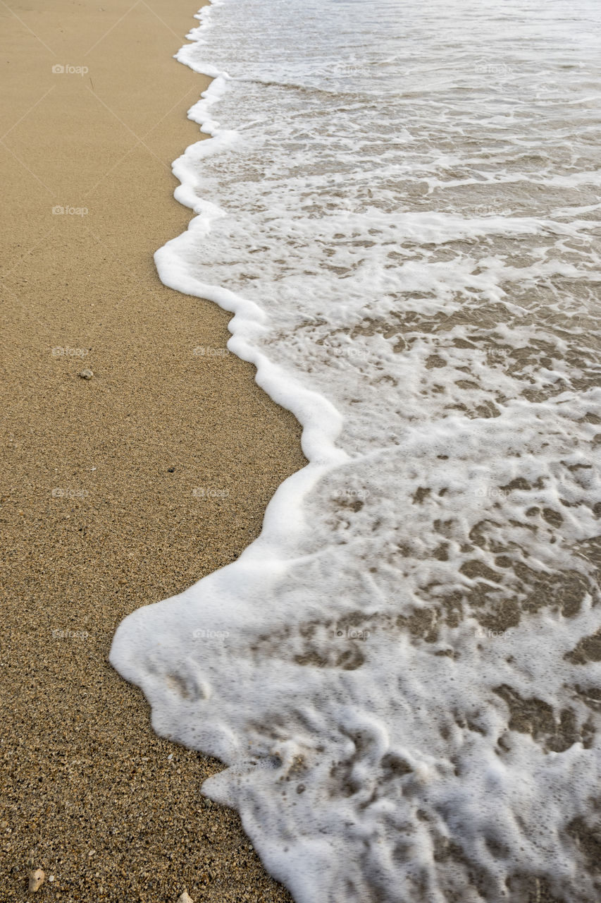 Close-up of waves on beach