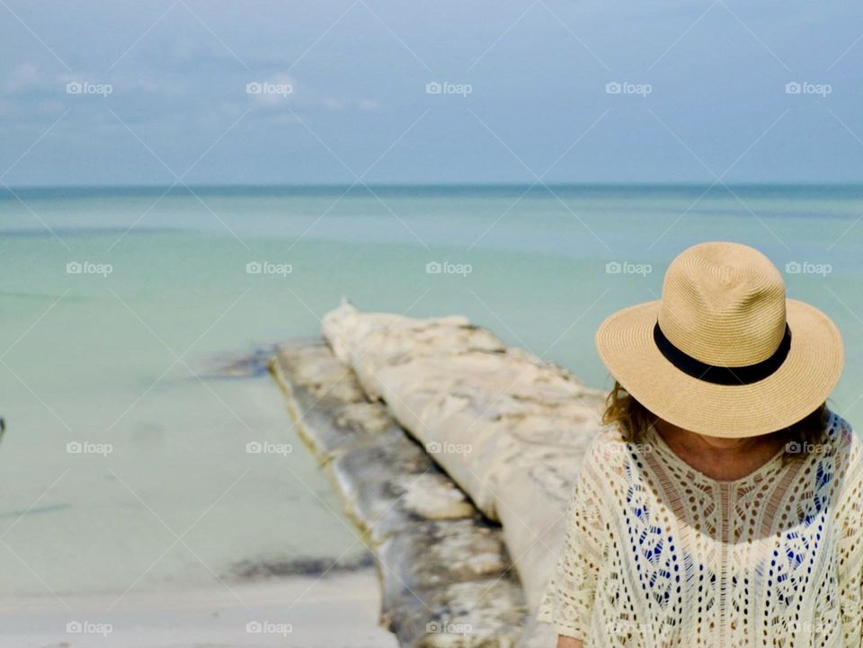 Mom on the beach in Holbox Mexico.