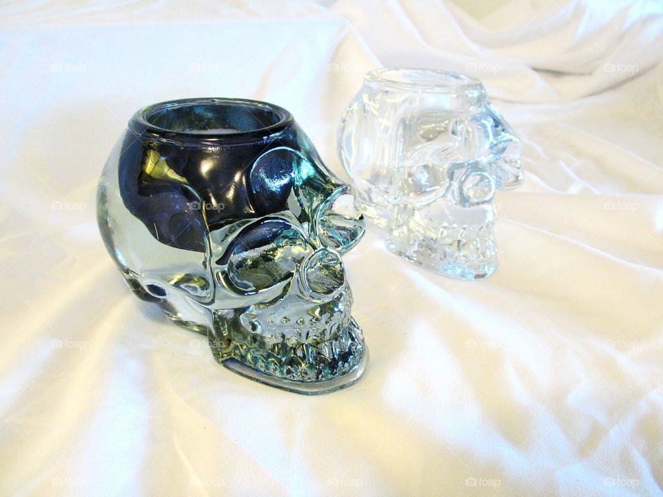 Pair of crystal skulls. Darkness and light pair of crystal skulls