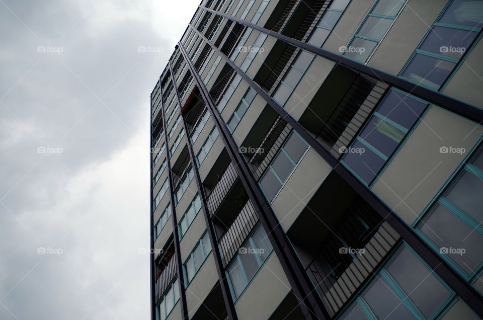 Low angle view of skyscraper against sky in Berlin, Germany.