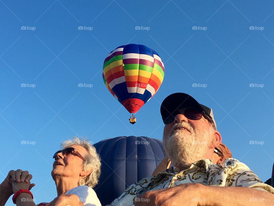 Happy Old Couple with Hot Air Balloon