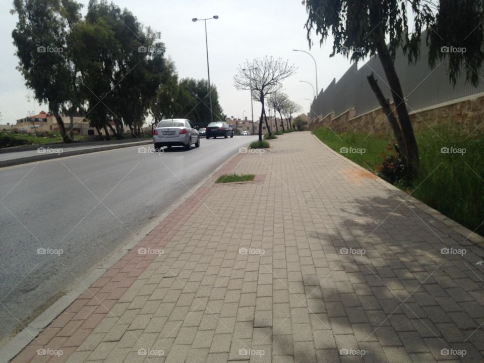 Road cloudy with cars in start of spring 