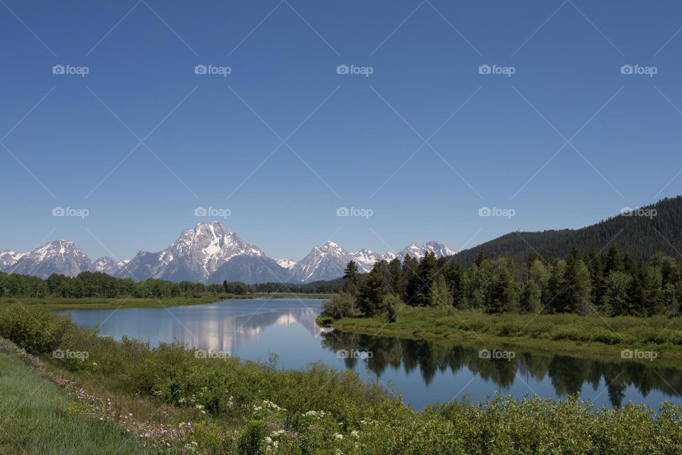 Enjoy the tranquility of beautiful lake and mountain