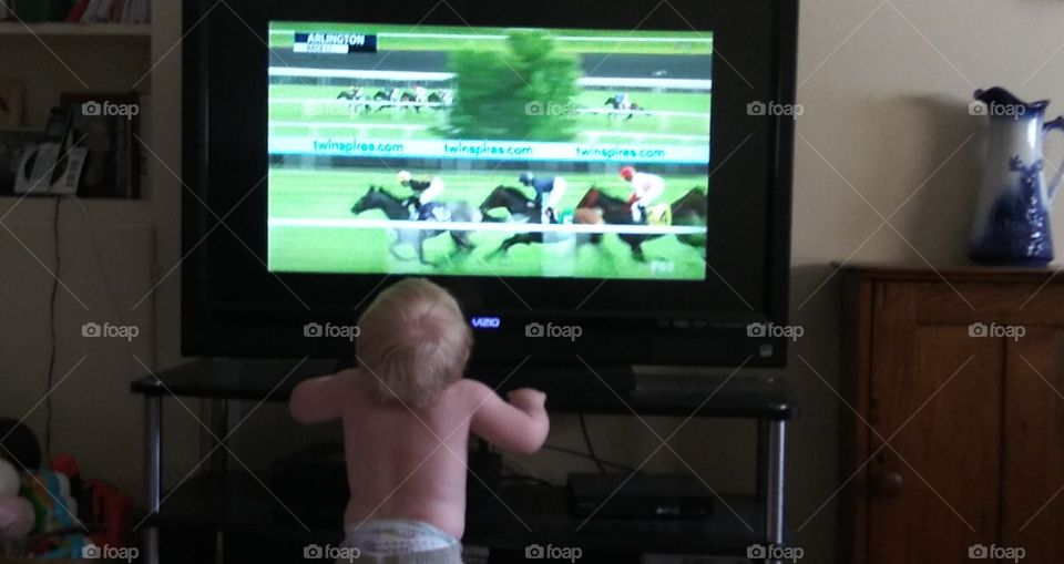 Young horse racing fan.