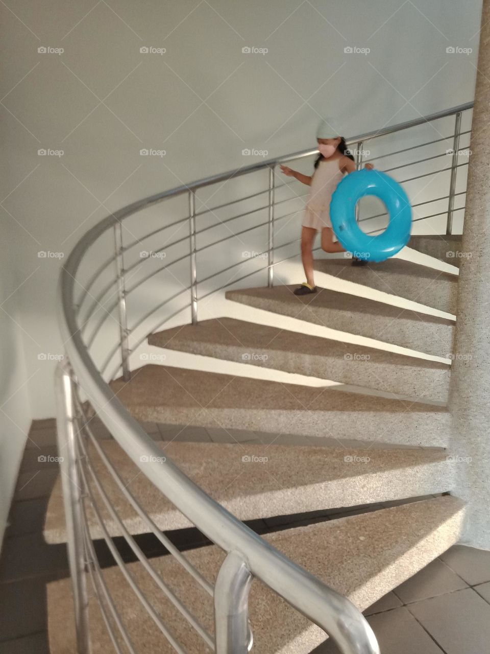 Kid down the stairway