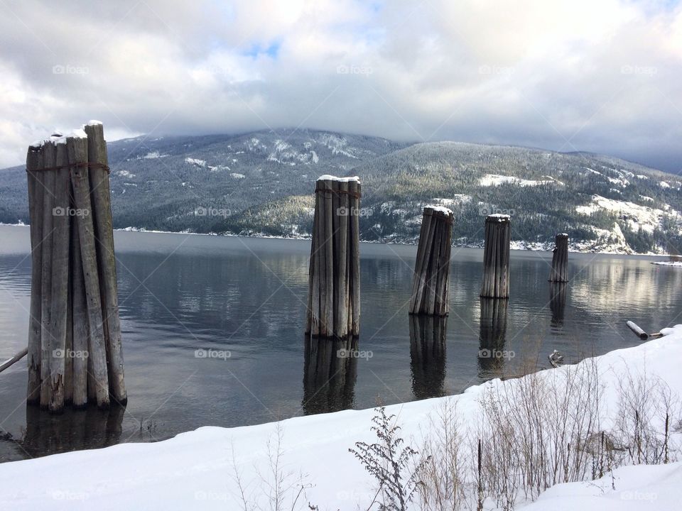 Boat piling on a lake 