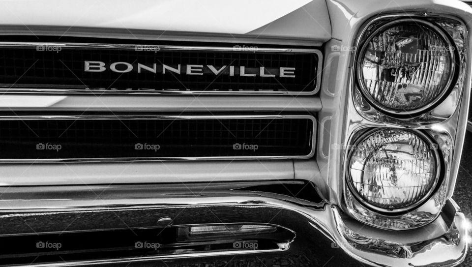 Pontiac Bonneville Front Grill And Double Headlights At A Classic Car Show 