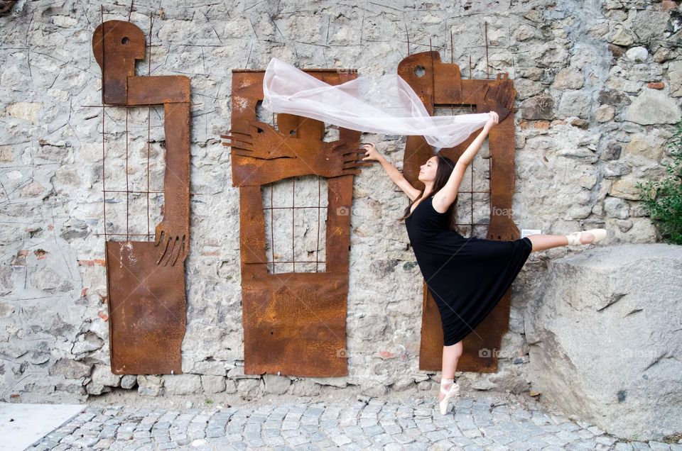 Young Female Ballerina Dancing with a Scarf Outside