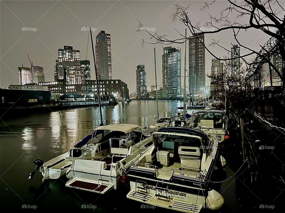 This is “Newtown Creek” by the “Pulaski Bridge” in LIC, Queens on an evening in early December 2023. Across the water is “Greenpoint”, Bklyn to the left, LIC as well as “Manhattan” on the right. Hypnotic Productions