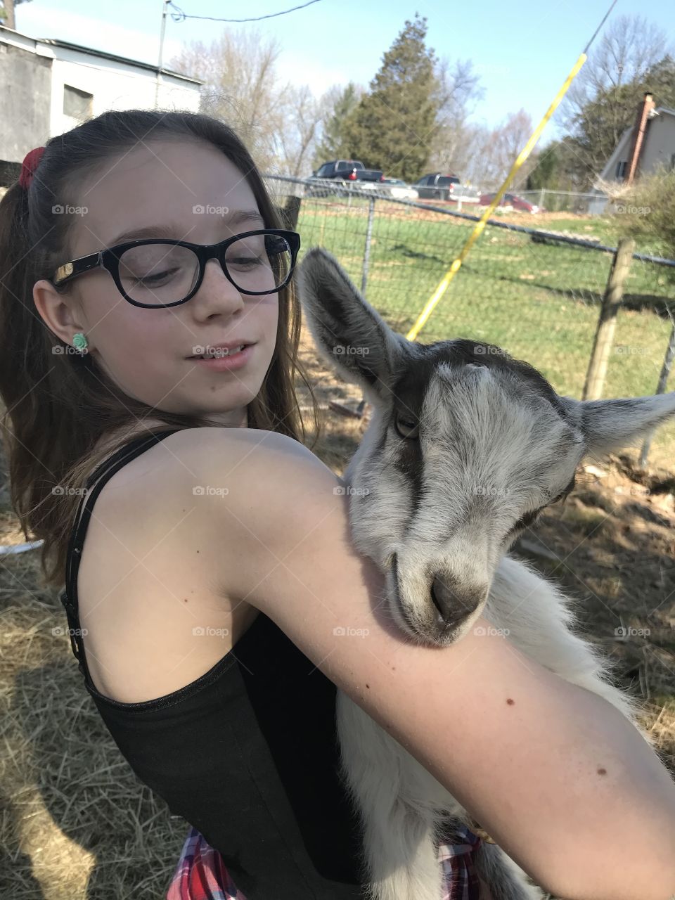 My daughter raises goats for 4H. This is her new baby, Piper, a precious mini alpine. 