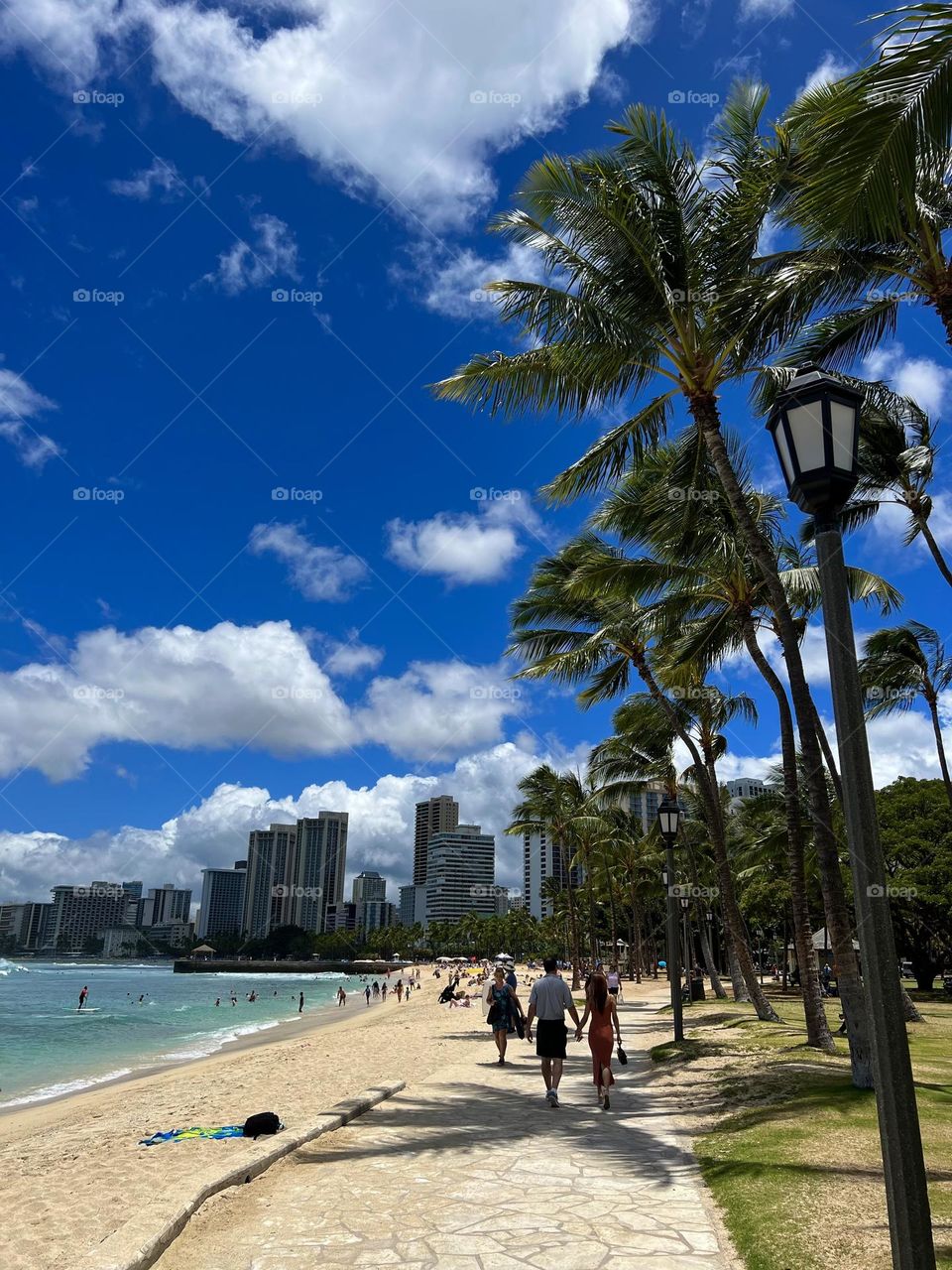 Walking across Sans Souci State Recreational Park in Honolulu Hawaii 