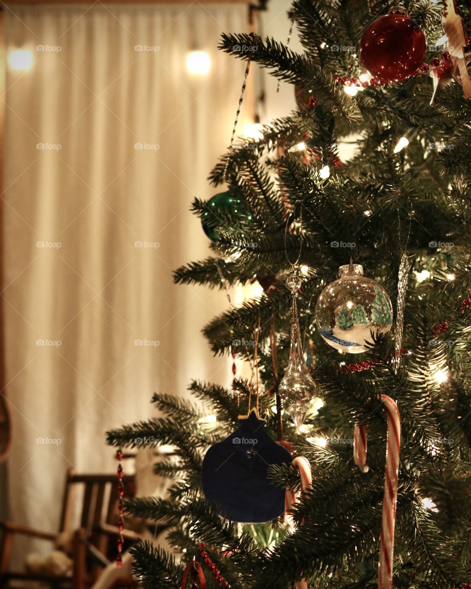 Christmas tree covered in decorations and ornaments