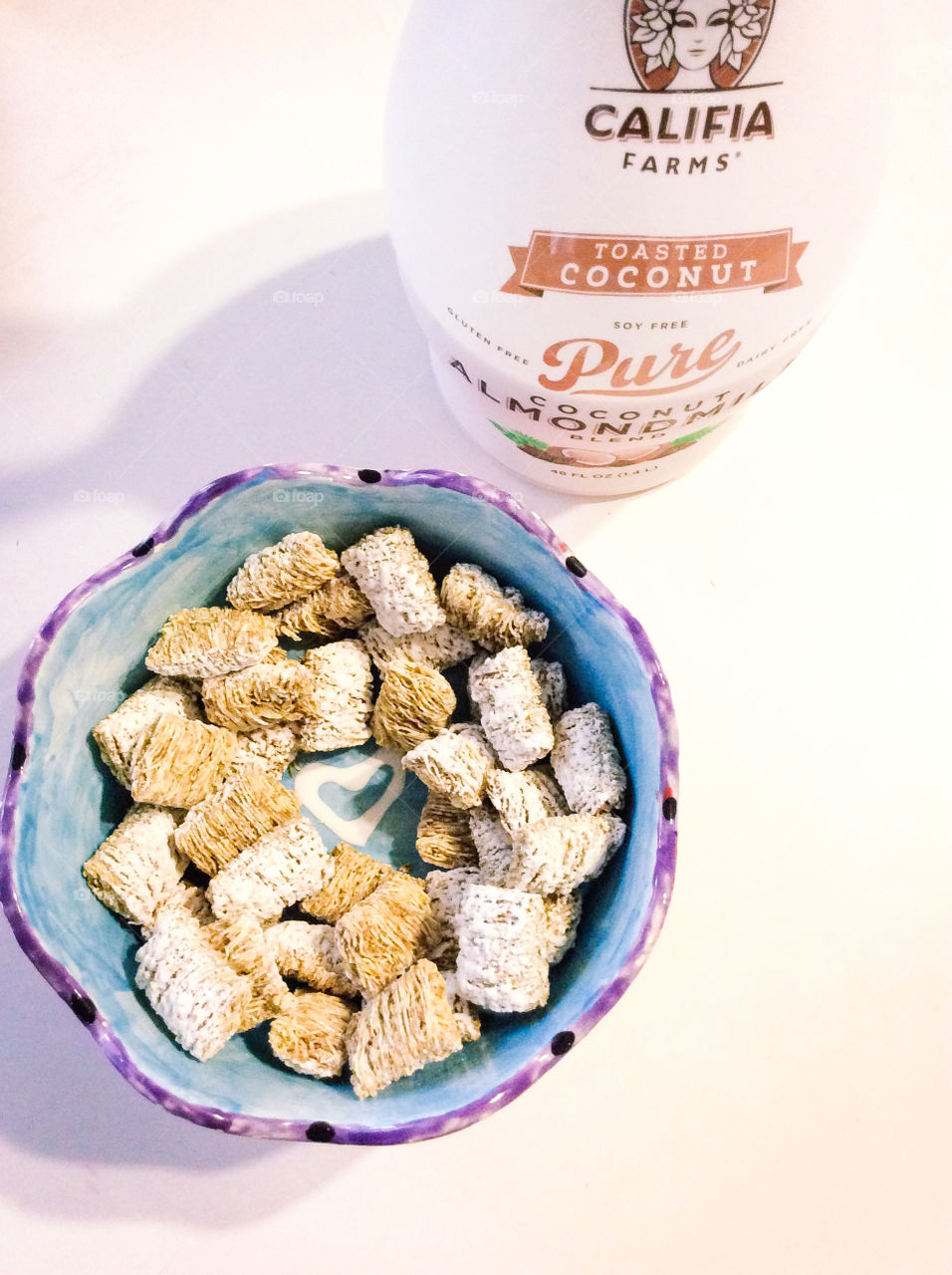 Good morning. Heart bowl cereal & coconut milk together = happy breakfast