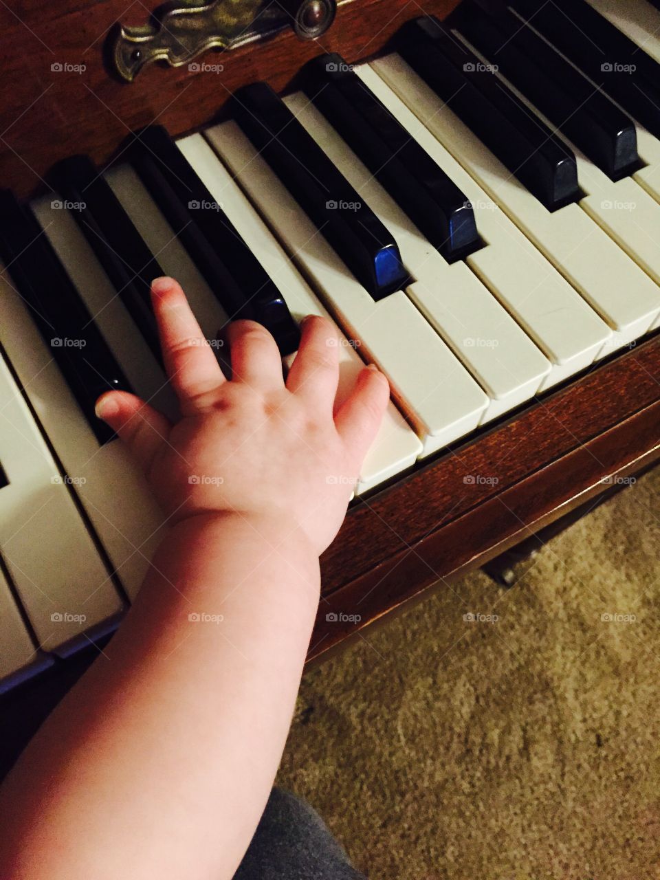 Little Fingers . Baby playing piano 