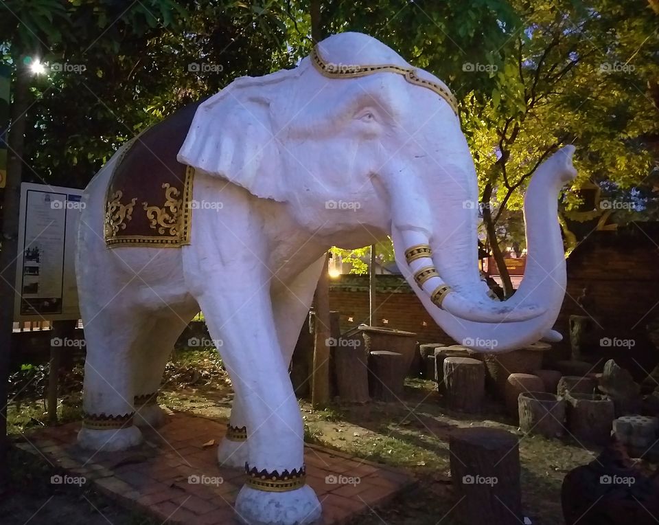 stucco elephant in temple. thailand.