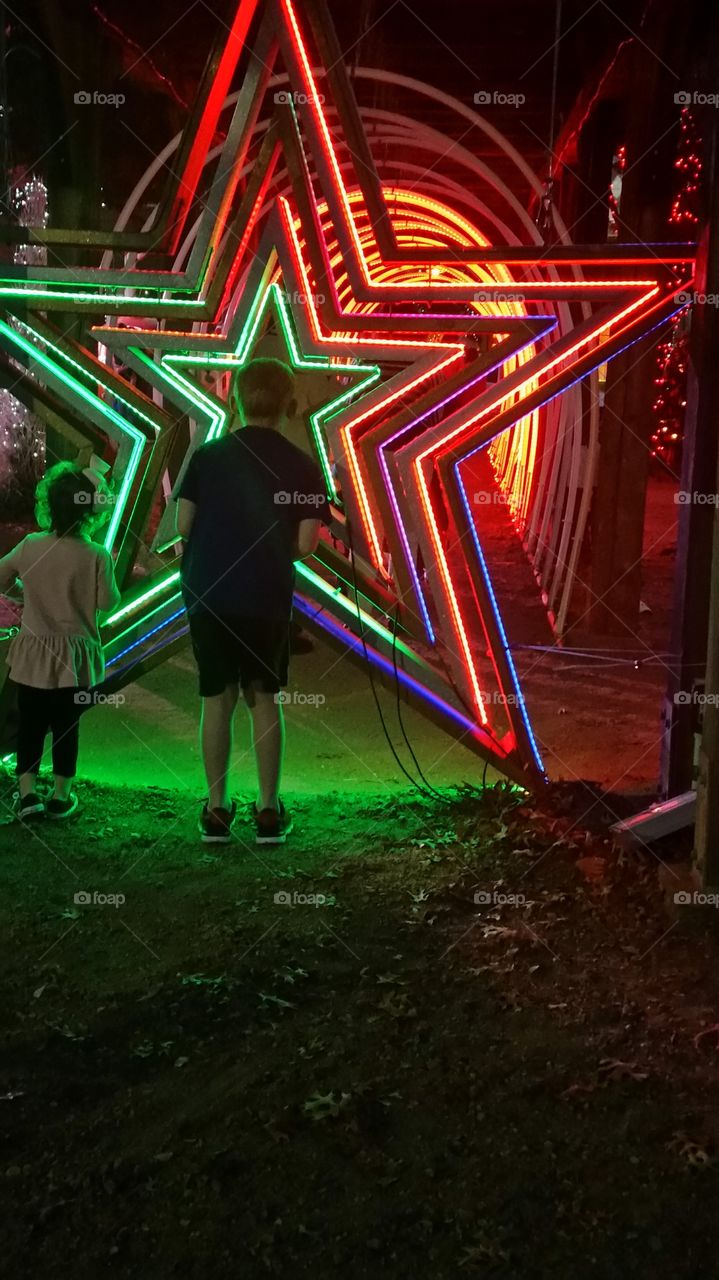 2 children and neon star