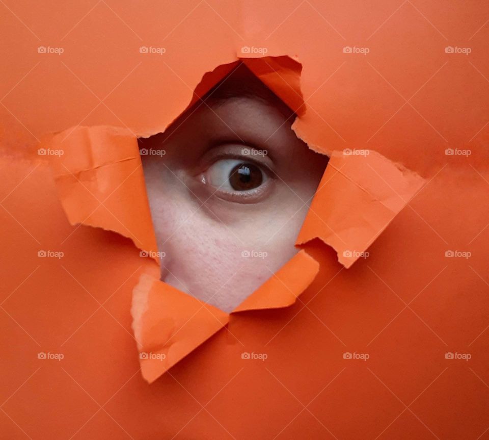 Peeping through a colored background