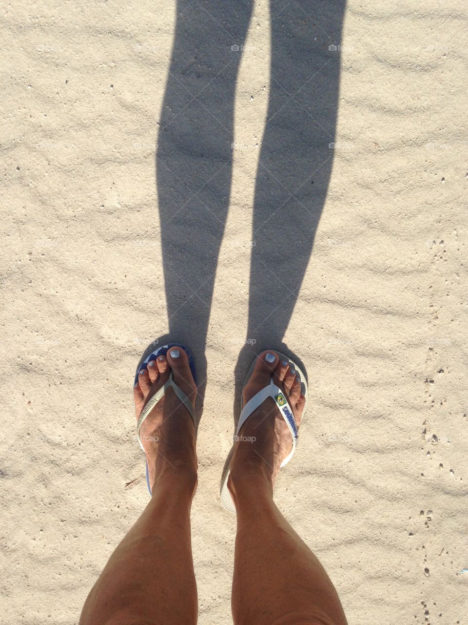 On my way to the beach. Woke up so early that had different slippers!