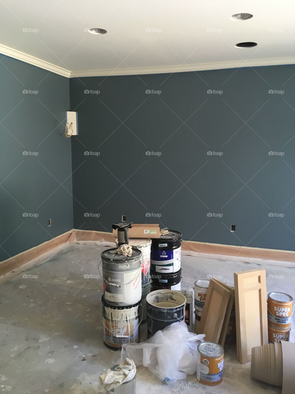 The pool room where I kept tools and extra paint items on the house I was painting 