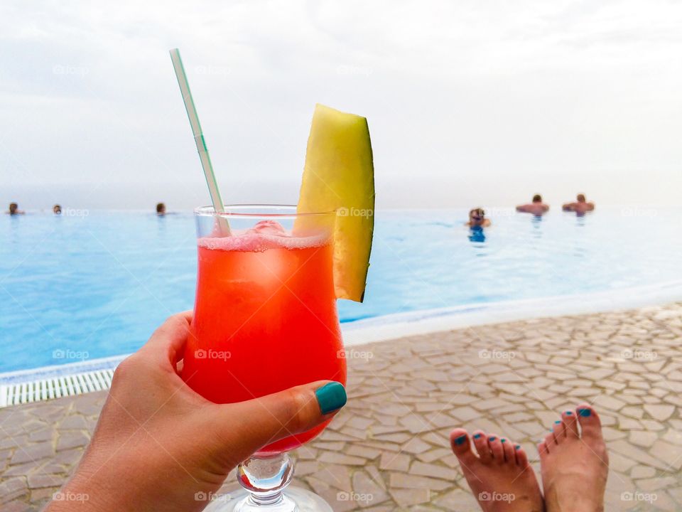 People enjoying near pool